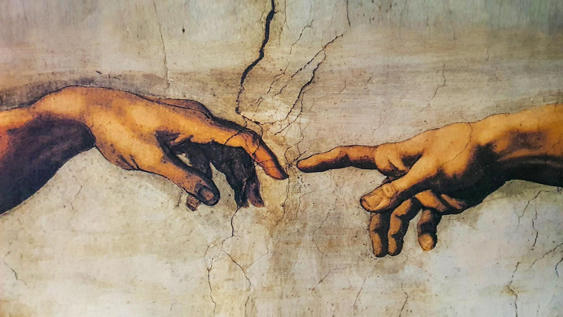 Deckengemälde "Die Erschaffung des Adam" von Michelangelo in der Sixtinischen Kapelle im Vatikan