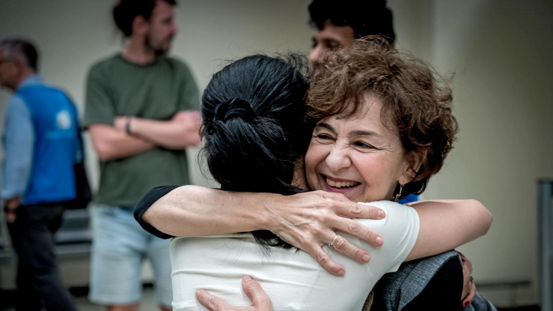 Sant'Egidio:  Begrüßung einer Geflüchteten